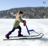 Girls Riding ESLA T2 kicksled on the ice at Devils Lake, Wisconsin State Park