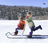 Girl and Toddler Boy riding ESLA T6 kicksled on Devils Lake in Sauk County, Wisconsin